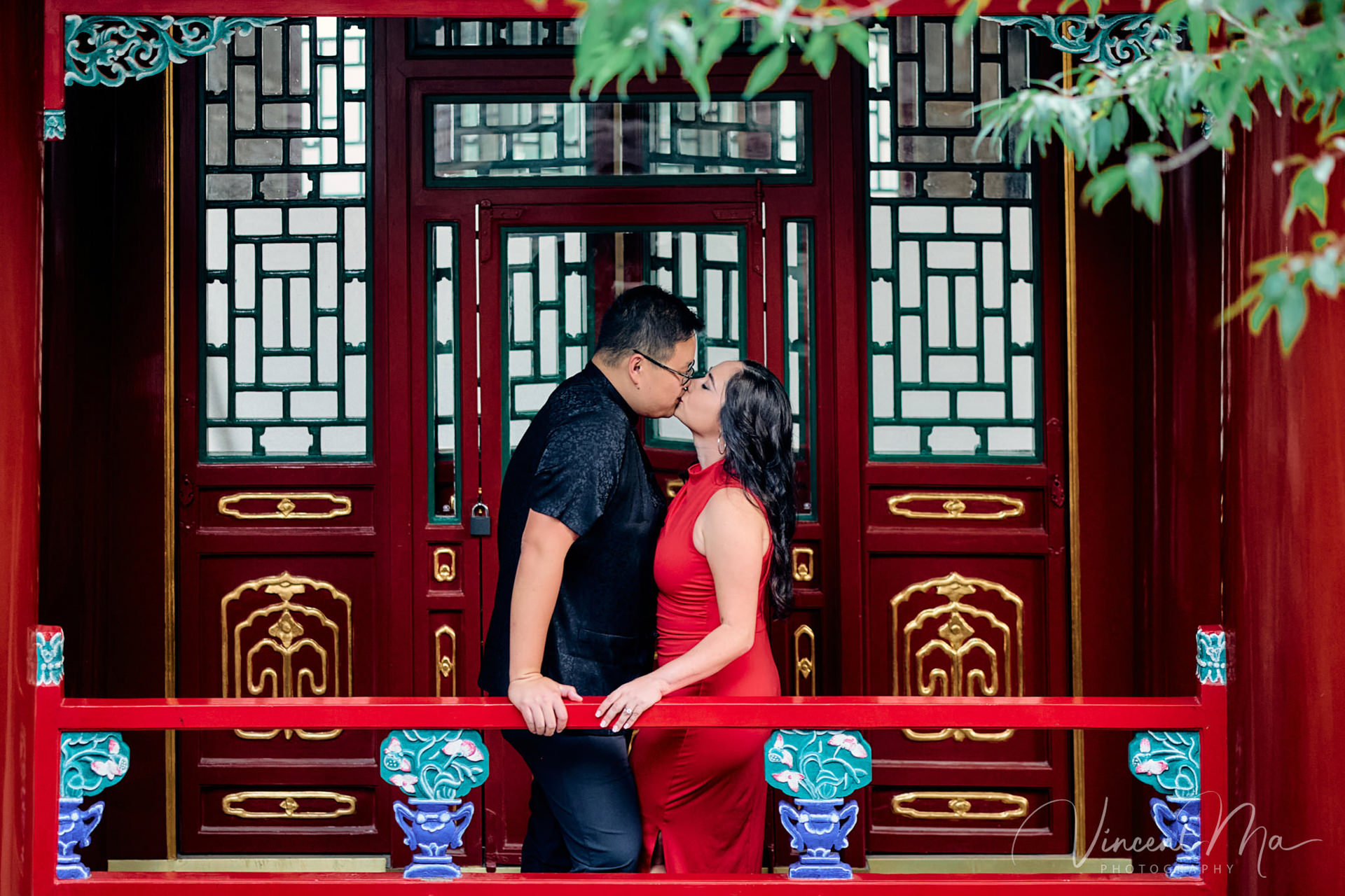 A couple enjoying an engagement photoshoot at the Summer Palace in Beijing, with traditional Chinese architecture and gardens in the background. Captured by a local Beijing photographer.