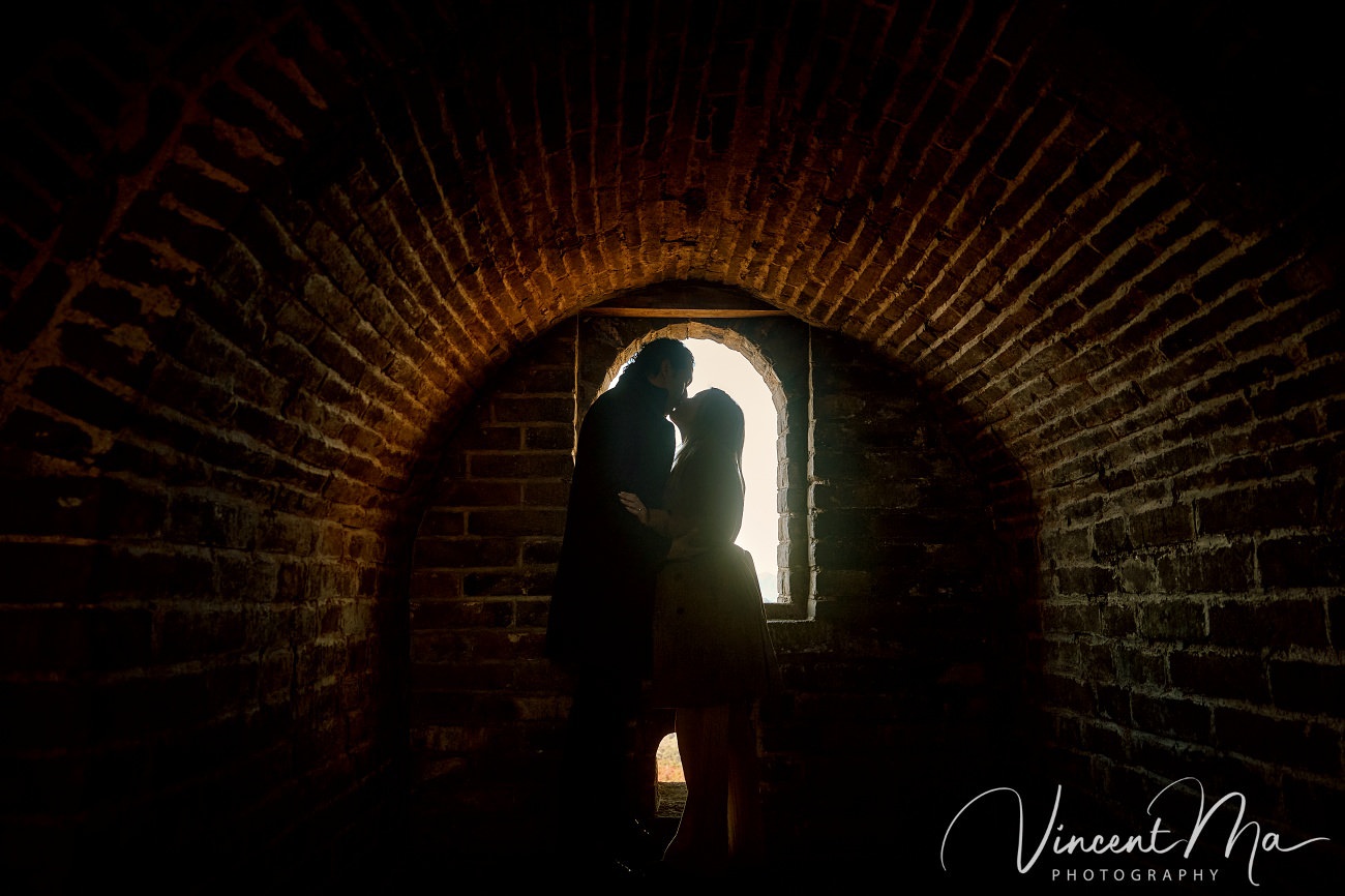 Surprise marriage proposal engagement shooting on Mutianyu Great Wall with ancient bricks and autumn leaves in background